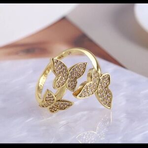 Women's Gold plated butterfly ring from katespade size 8 adjustable